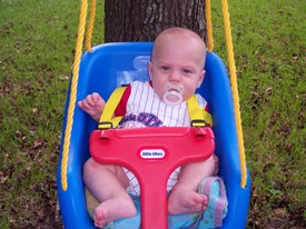 Mon Sep 26 18:34:54 2005

Mommy bought this swing for me, and Daddy and Grandpa Hightower hung it a few weeks ago.  It's great!