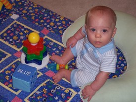 Wed Nov 30 13:09:28 2005

Andrew can almost sit up on his own now.  He falls over if he doesn't have a little assistance, but just his hand on something to steady him works to keep him up.