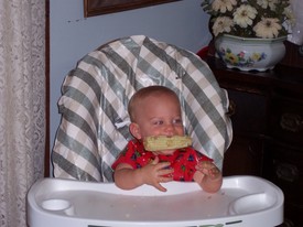 Sun Jun 18 13:07:34 2006

First corn on the cob, at Father's Day dinner at Mema and Papa's house.  Andrew made everybody laugh out loud with his antics with this corn cob...