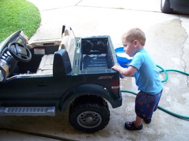 Sat 17 May 2008 06:46:08 PM

Mom and Andrew washed their cars while dad mowed the grass.