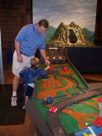 Sat 12 Jul 2008 10:44:52 AM

Dad and Andrew float boats in one of the water features at the South Carolina Children's Museum in Charleston.