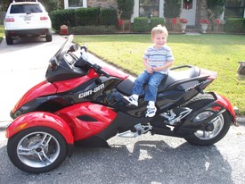 Wed 24 Dec 2008 03:40:58 PM

Andrew sitting on Mrs. Pam's new Spyder.