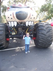 Fri 27 Feb 2009 04:28:00 PM

Monster Jam tickets sold out before we got any, but Andrew, Mom, and Dad did go around town and have a look at a few of the trucks.  This one is Taz.