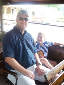 Thu 30 Jul 2009 10:56:11 AM

Dad and Andrew on the train at the Tweetsy Railroad in Boone, NC.  Andrew said that this train ride was his favorite part of the day, and what a big day it was!