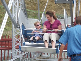 Thu 30 Jul 2009 12:33:26 PM

Andrew and mom board the ferris wheel.