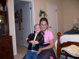 Fri 18 Sep 2009 08:03:03 PM

Dad snapped this photo of Andrew and Mom after they got back from the Sock Hop and Gracie was in bed.