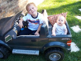 Fri 06 Nov 2009 03:55:20 PM

Gracie gets her first ride in Andrew's Ford F-150 Power Wheels.