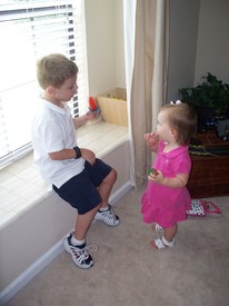 Mon 23 Aug 2010 02:50:16 PM

Andrew tells Gracie about his first day back to school while enjoying a very low-carb popsicle that mom made for him.