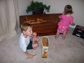 Sun 03 Oct 2010 06:17:55 PM

Andrew and Gracie play Lincoln Logs together.