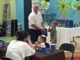 Thu 07 Jun 2012 07:04:52 PM

Andrew gets a trophy from his coach.