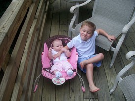 Sat 01 Aug 2009 09:44:35 AM

Andrew and Gracie on the deck at the house we rented in Beech Mountain, NC for the week.