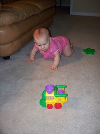 Fri 30 Oct 2009 08:37:11 AM

Gracie has started to crawl a little...