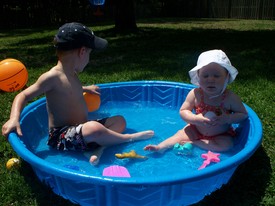 Thu 22 Apr 2010 02:00:19 PM

Andrew and Gracie enjoy an afternoon in the kiddie pool.  Dad was out of town for a job interview.