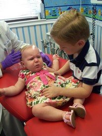 Fri 23 Apr 2010 09:32:39 AM

Andrew tries to comfort Gracie during her first visit to the dentist.