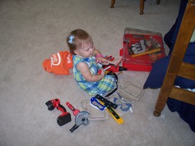 Fri 20 Aug 2010 02:39:27 PM

Gracie loves getting into Andrew's toys.